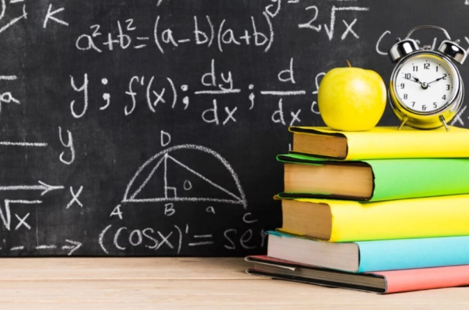 school-desk-with-blackboard-maths
